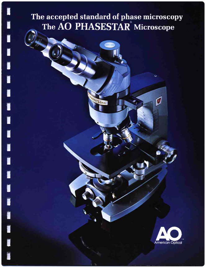 A close-up of a microscope
Description automatically generated