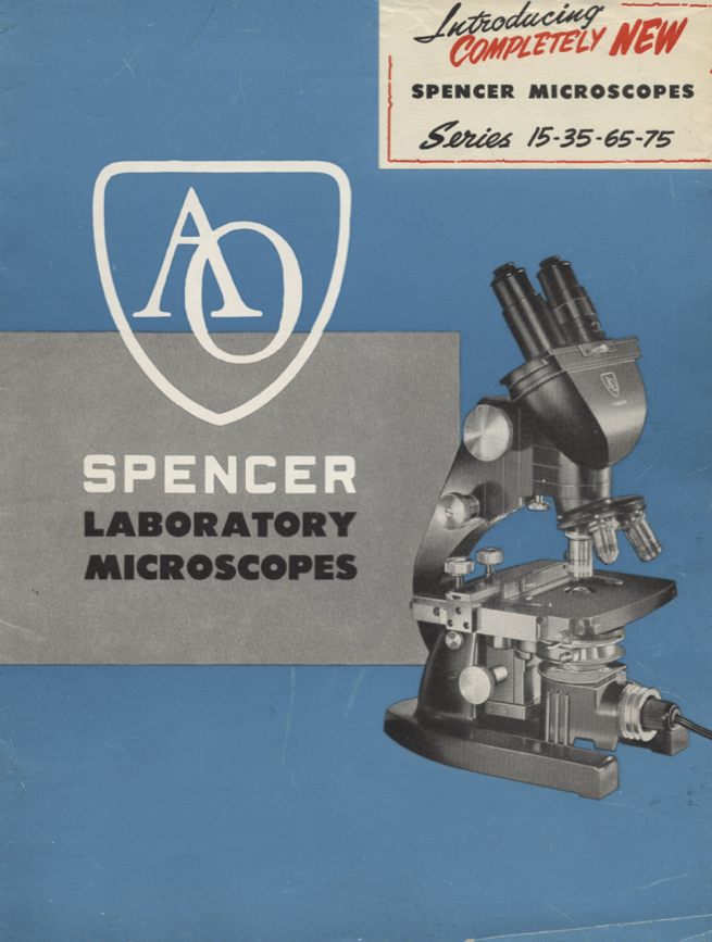 A blue and white cover with a microscope
Description automatically generated