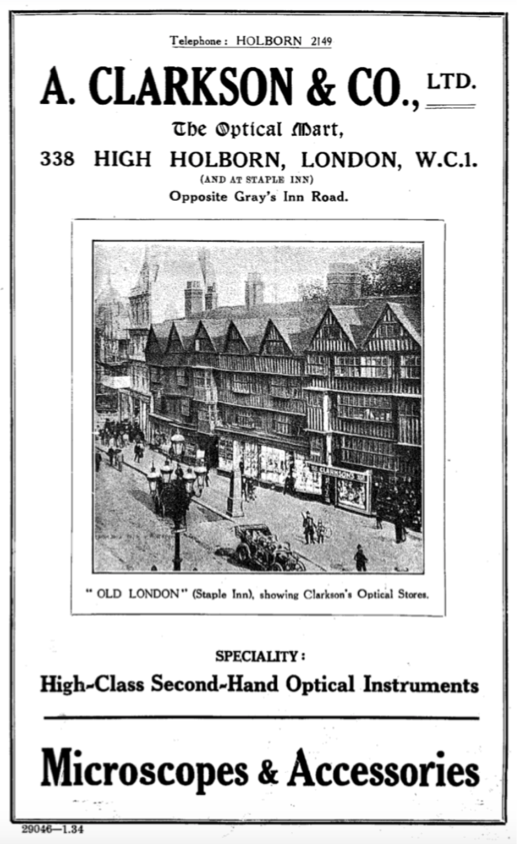 A black and white photo of a building
Description automatically generated