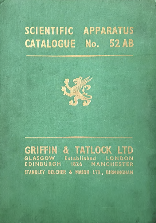 A green book with gold text
Description automatically generated