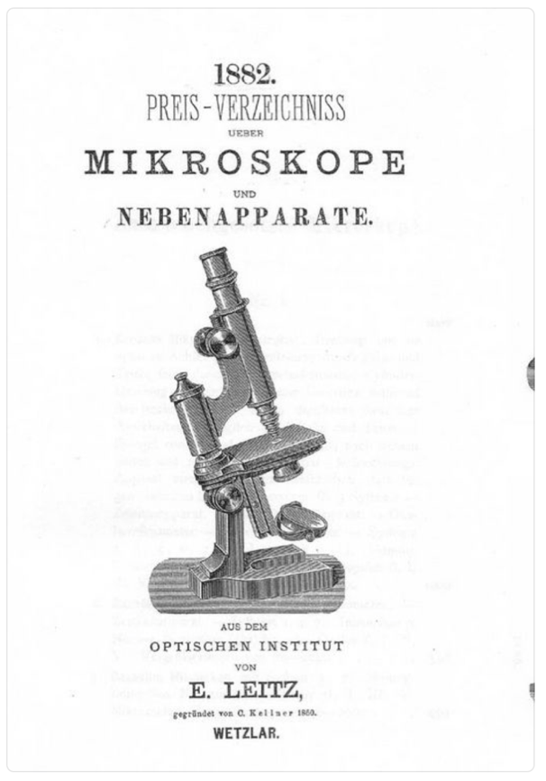 A close-up of a microscope
Description automatically generated