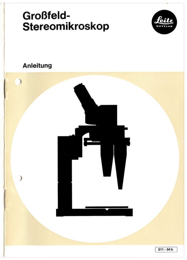 A black and white image of a microscope
Description automatically generated