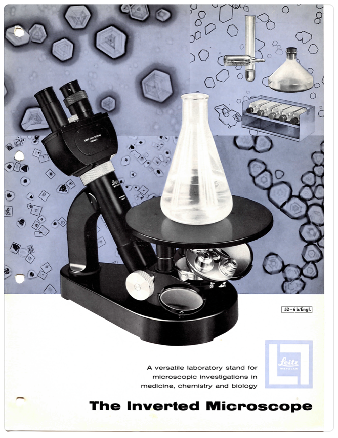 A microscope with a beaker and a tube
Description automatically generated with medium confidence