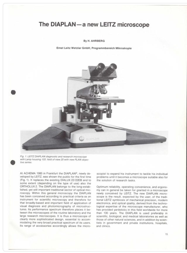 A close-up of a microscope
Description automatically generated