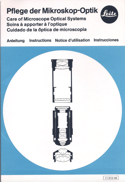 A blue and white sign with black and white symbols
Description automatically generated