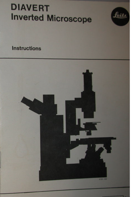 A black silhouette of a microscope
Description automatically generated