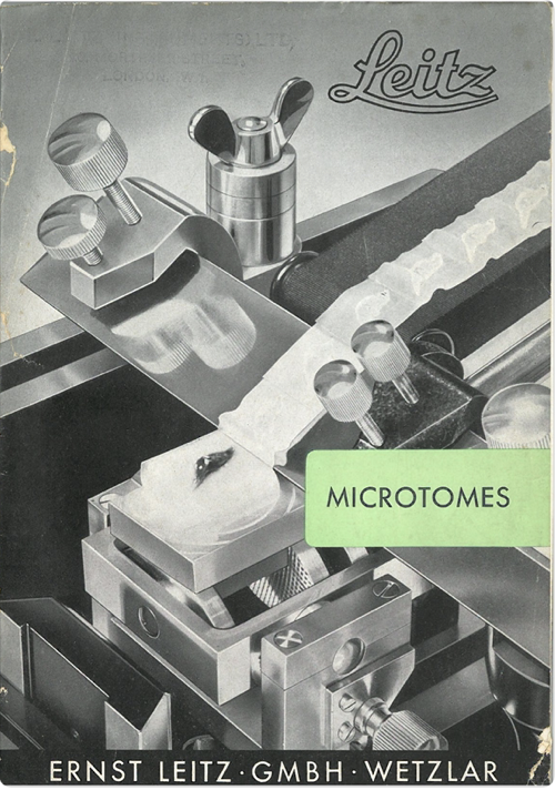 A close-up of a microscope
Description automatically generated