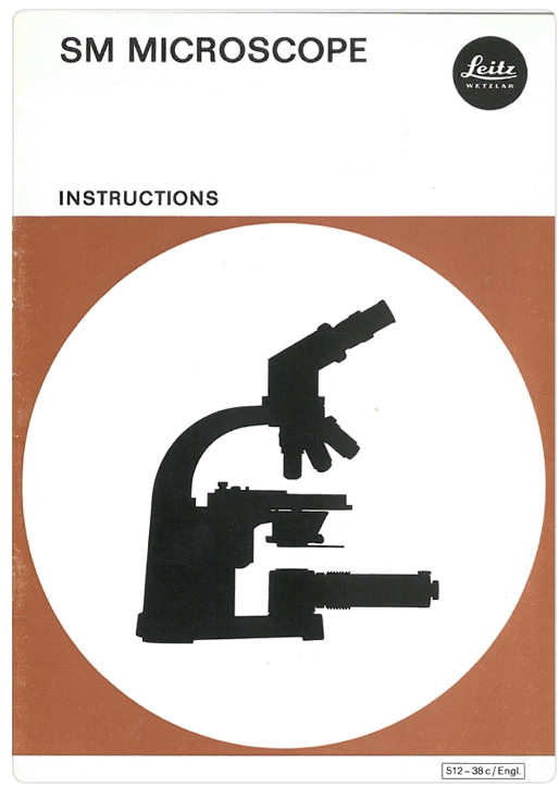 A close-up of a microscope
Description automatically generated