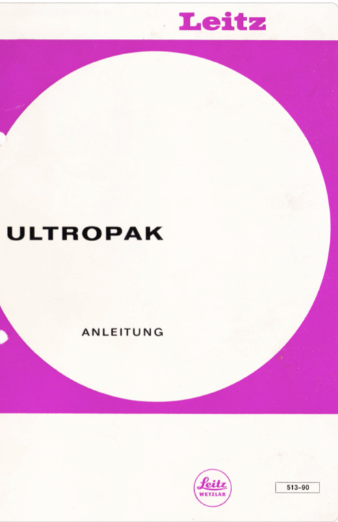 A purple and white cover with a white circle
Description automatically generated