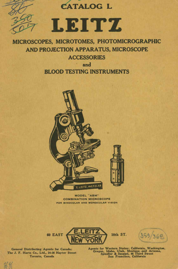 A book with a microscope and a test tube
Description automatically generated
