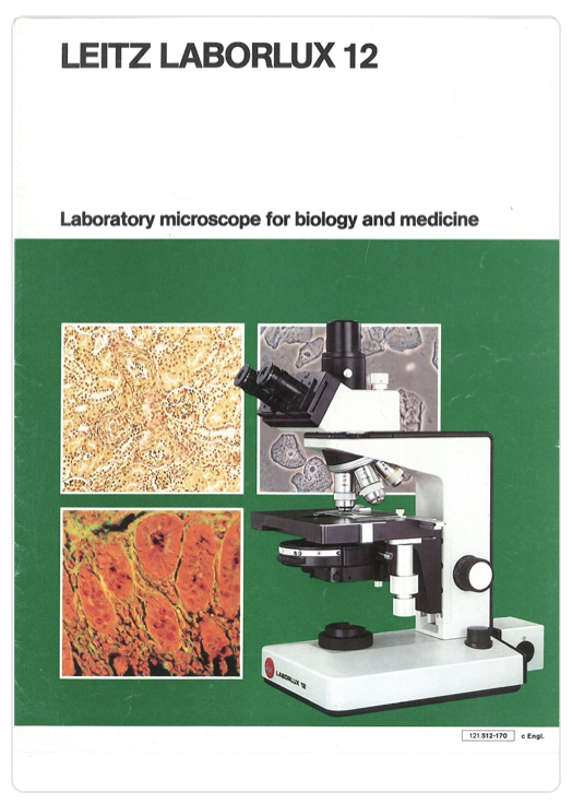 A book cover with a microscope
Description automatically generated