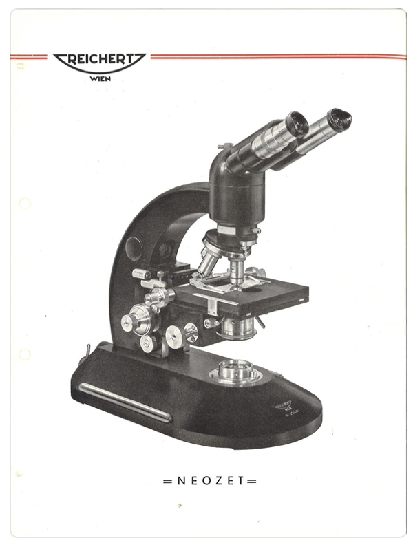 A black and white photo of a microscope
Description automatically generated