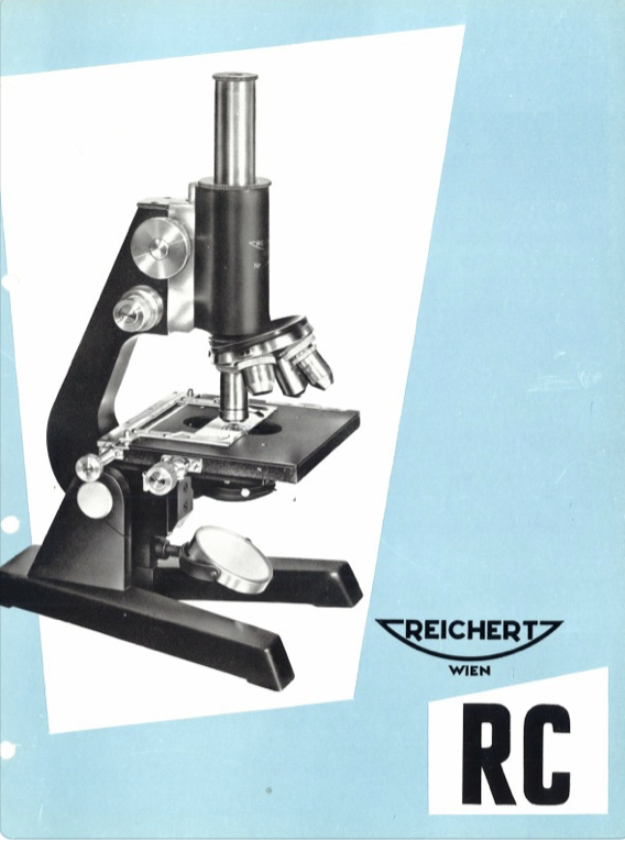 A black and silver microscope
Description automatically generated