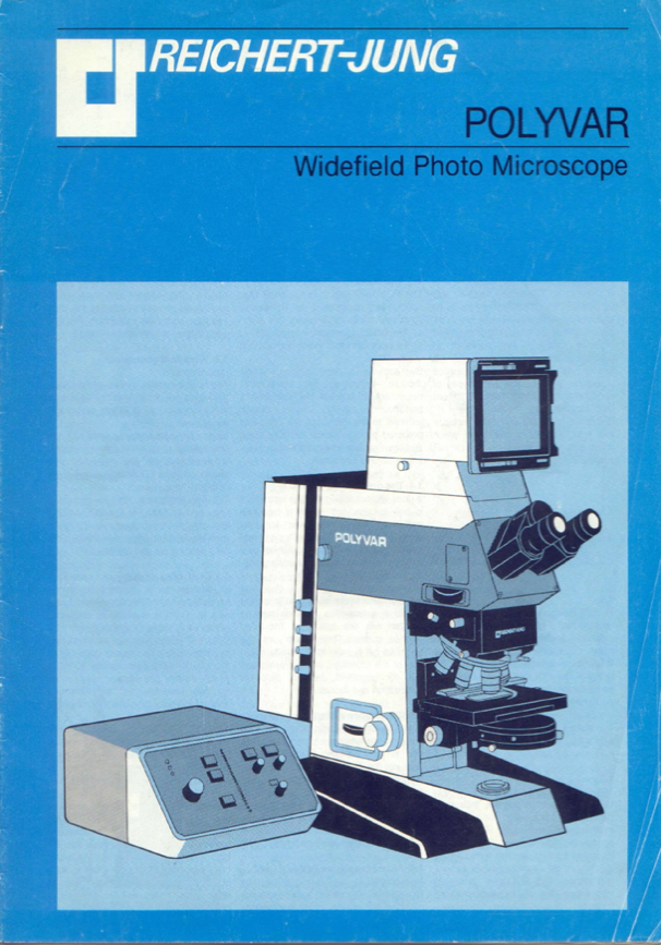 A blue cover with a microscope
Description automatically generated