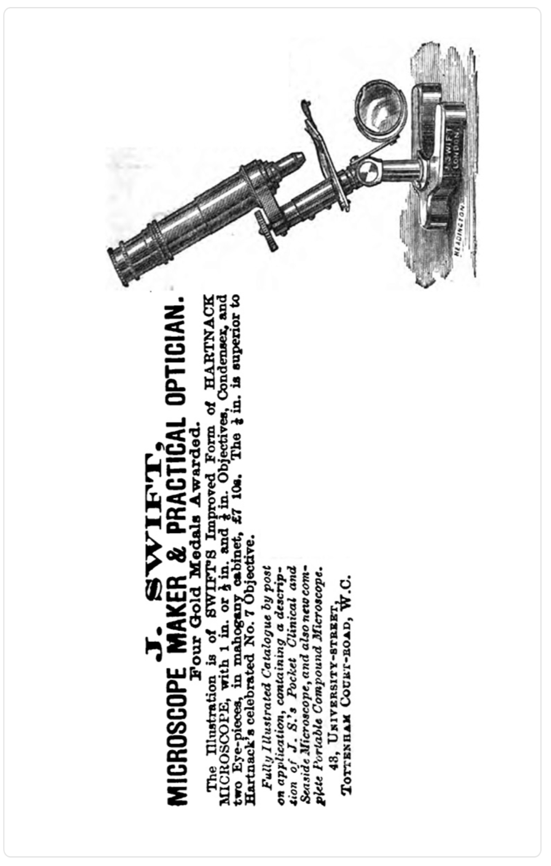 A close-up of a microscope
Description automatically generated