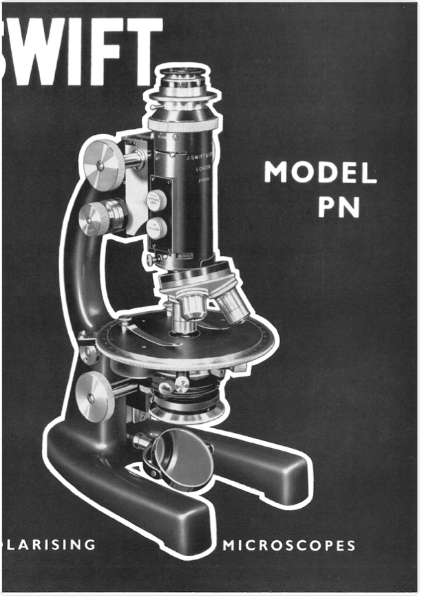 A close-up of a microscope
Description automatically generated