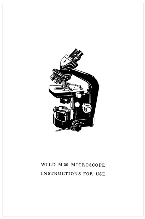 A black and white picture of a microscope
Description automatically generated