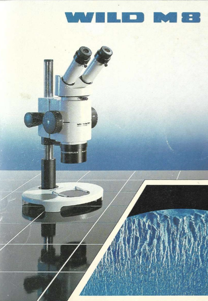 A microscope on a black surface
Description automatically generated