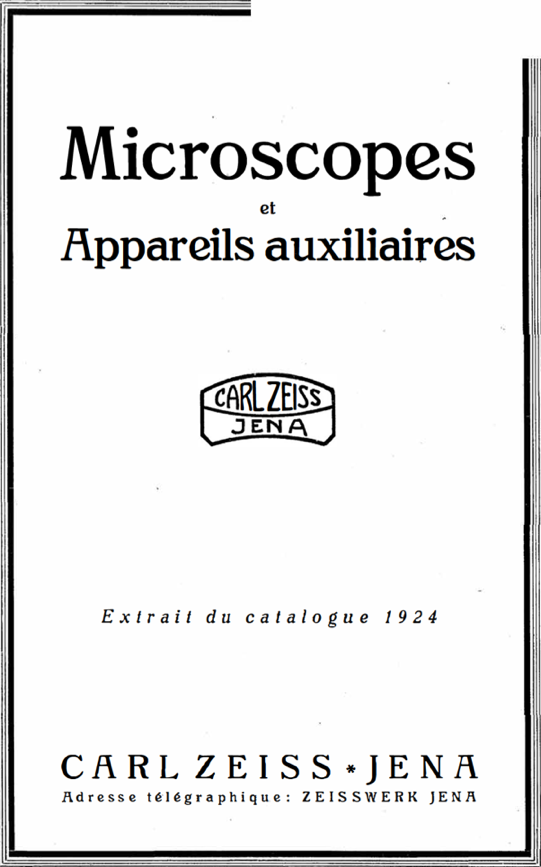 A white and black cover with text
Description automatically generated