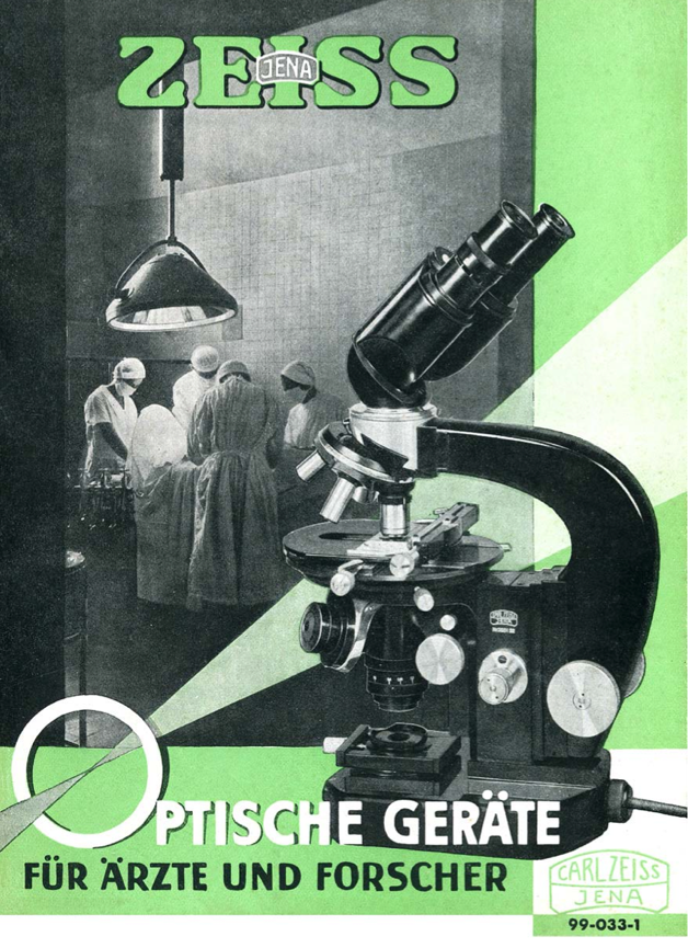 A black and white photo of a microscope
Description automatically generated