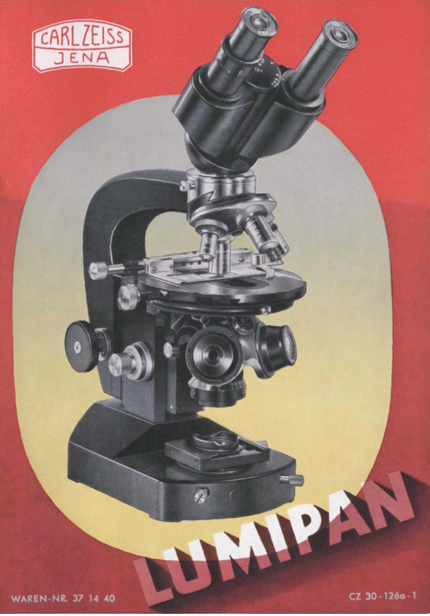 A black and silver microscope
Description automatically generated