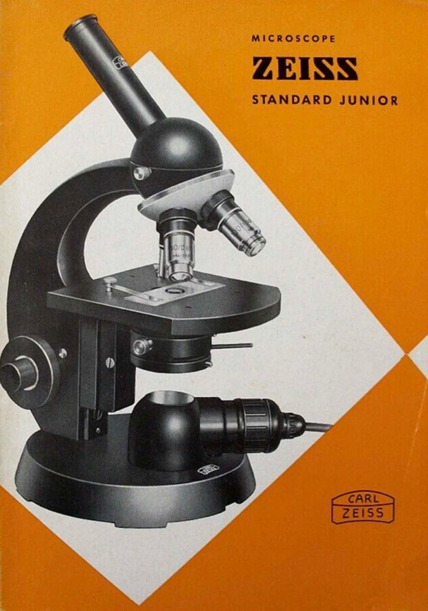 A black and white microscope
Description automatically generated