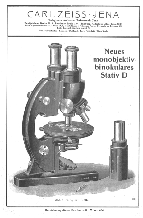 A black and white photo of a microscope
Description automatically generated
