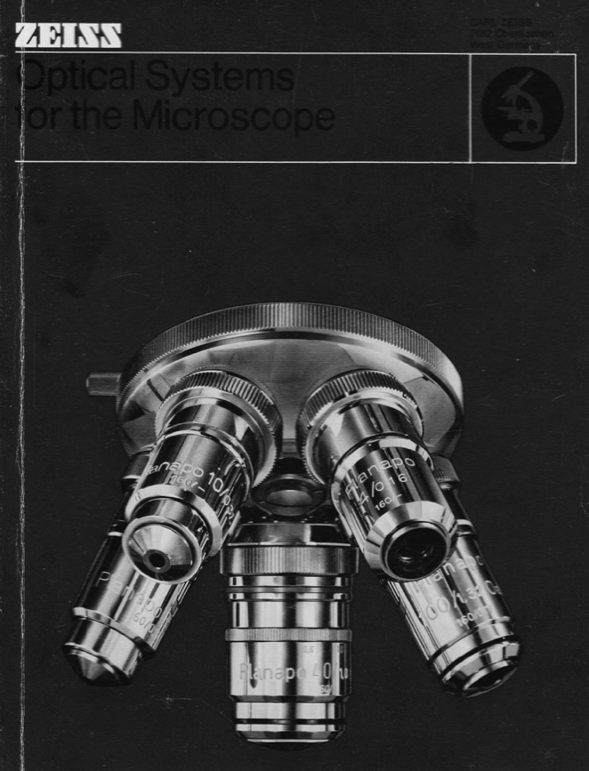 A close-up of a microscope
Description automatically generated