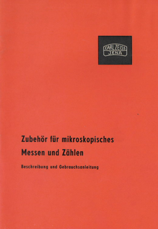 A red cover with black text
Description automatically generated