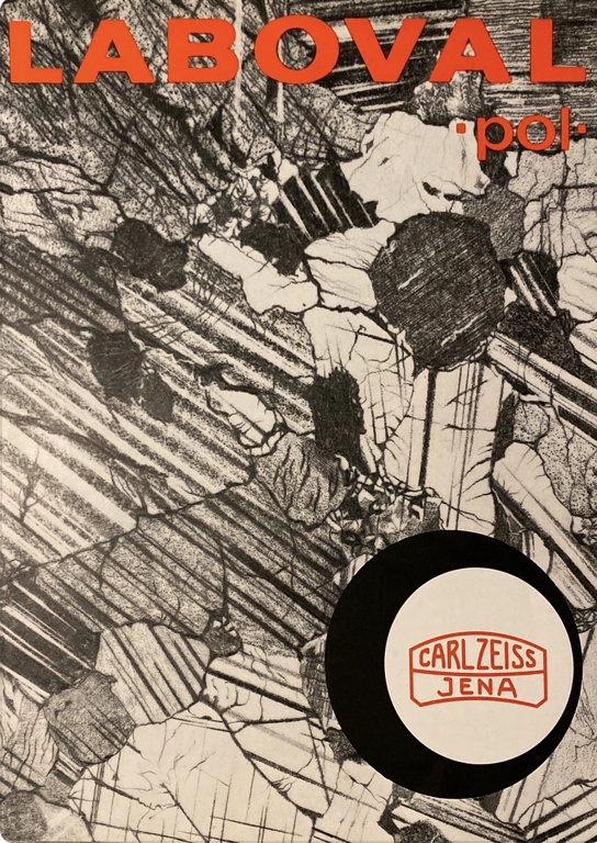 A black and white cover with a white circle and black text
Description automatically generated