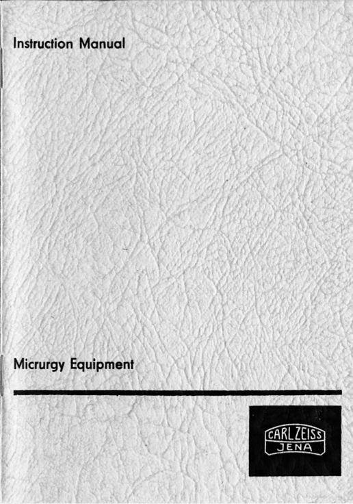 A white leather cover with black text
Description automatically generated