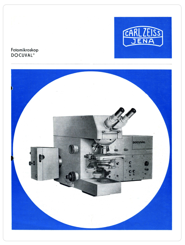 A white and blue cover with a microscope
Description automatically generated