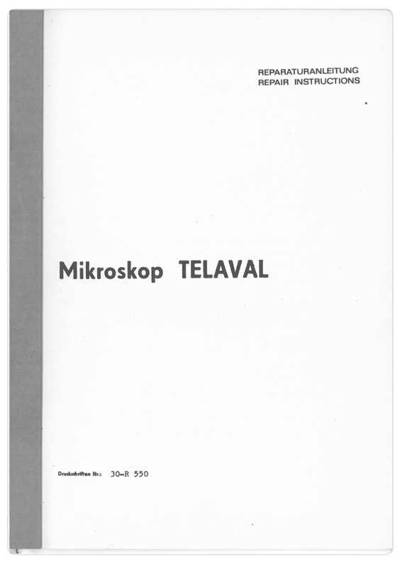 A white and grey manual
Description automatically generated