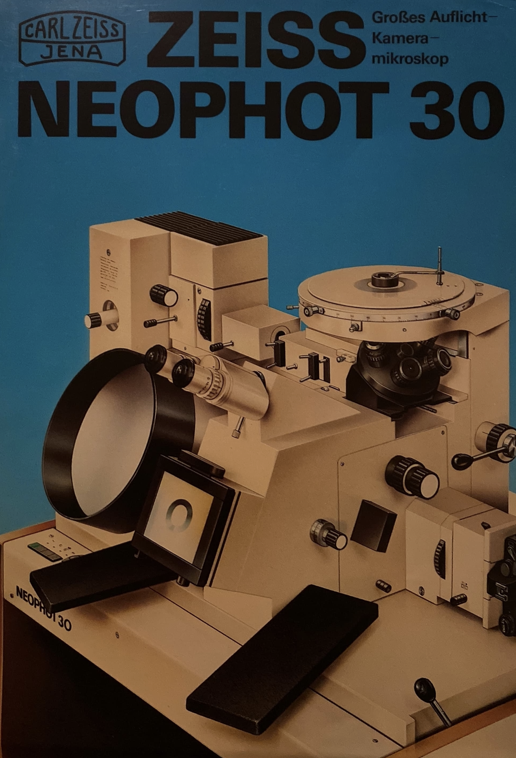 A book cover with a machine
Description automatically generated