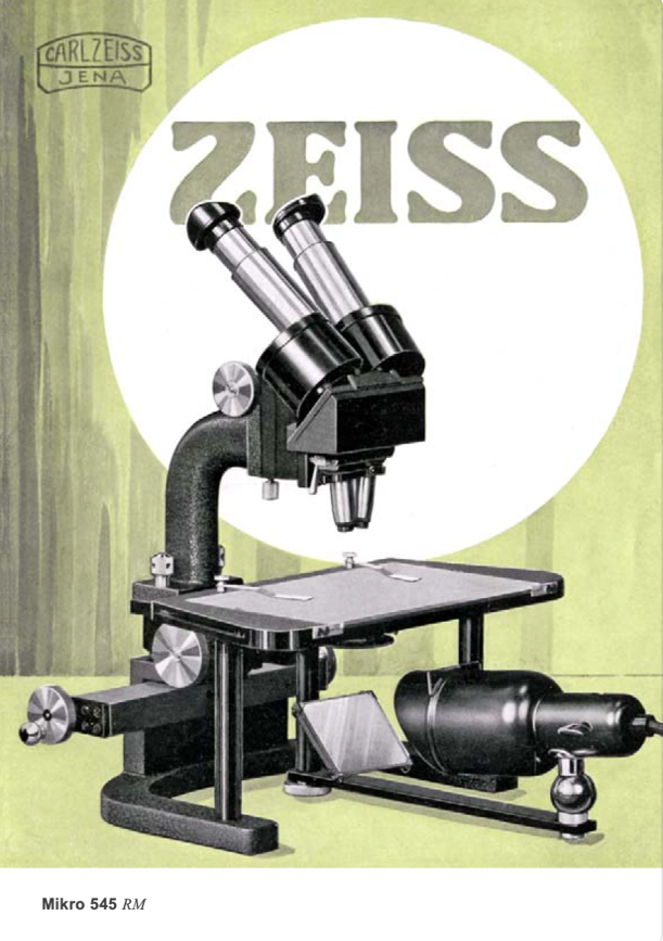 A microscope with a white circle and text
Description automatically generated with medium confidence