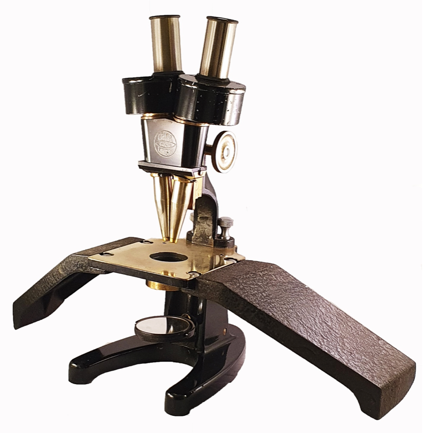 A close-up of a microscope
Description automatically generated