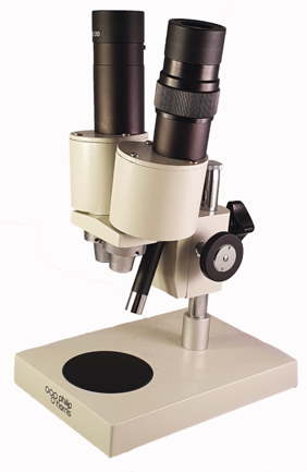 A white and black microscope
Description automatically generated