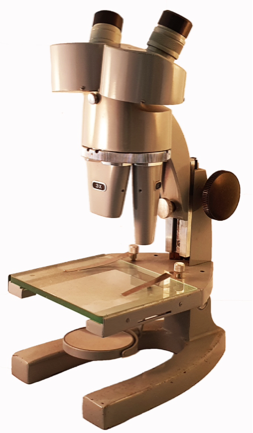 A close-up of a microscope
Description automatically generated