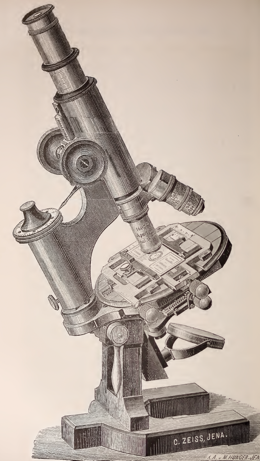 A picture containing microscope
Description automatically generated