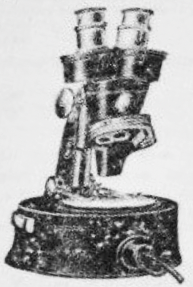 A black and white image of a microscope
Description automatically generated with medium confidence