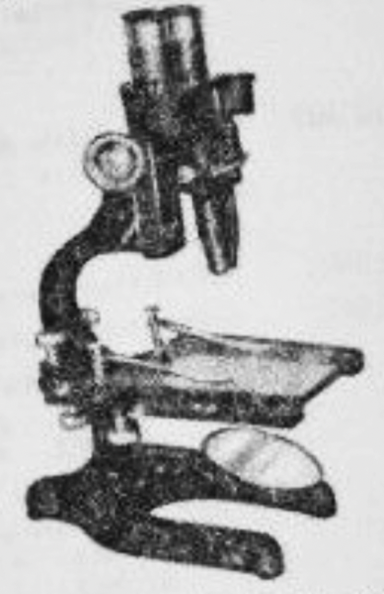 A close-up of a microscope
Description automatically generated