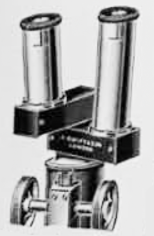 A black and white photo of a machine
Description automatically generated with low confidence