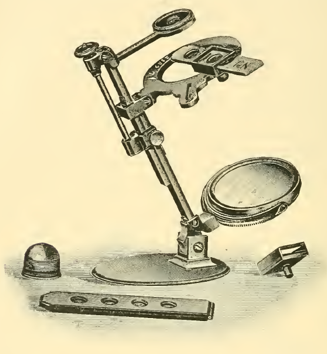 A picture containing indoor, sitting, photo, old
Description automatically generated