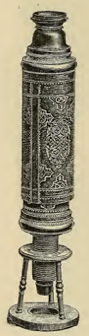 A picture containing indoor, sitting, photo, old
Description automatically generated
