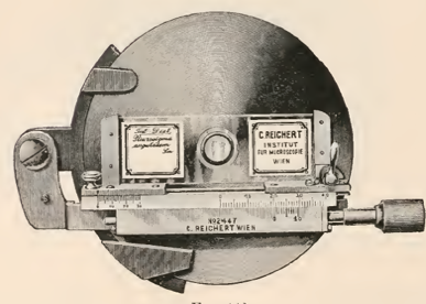 A picture containing photo, sitting, old, meter
Description automatically generated