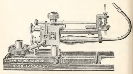 A picture containing appliance, sitting, photo, old
Description automatically generated