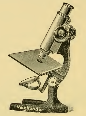 A picture containing small, old, sitting, table
Description automatically generated