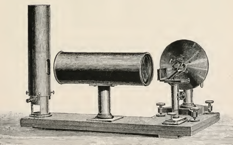 A picture containing appliance, photo, sitting, person
Description automatically generated