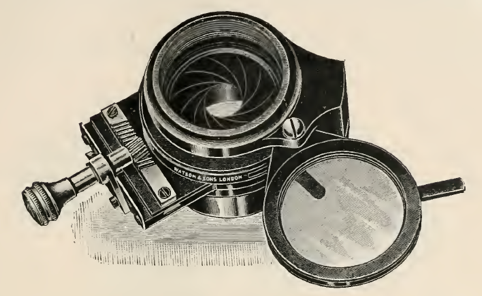 A picture containing motorcycle, sitting, old, table
Description automatically generated