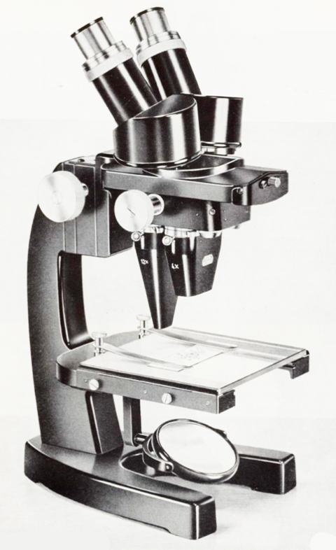 A close-up of a microscopeDescription automatically generated